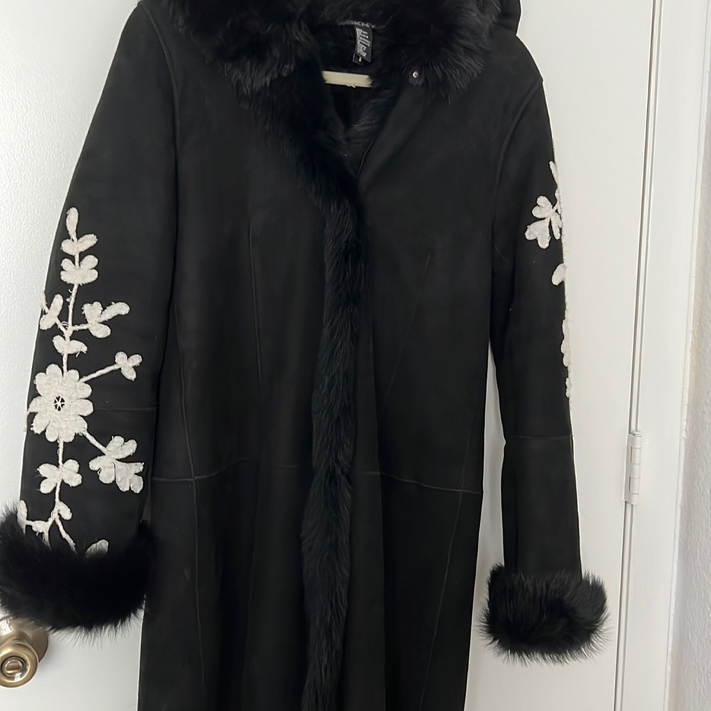 Long black suede embroidered, Donna Karen coat. A pho fur lining.